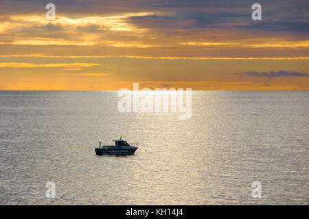 Chesil Beach, UK. 13th Nov, 2017. UK Weather. People make the most of the calm, sunny weather along Chesil beach, Isle of Portland Credit: stuart fretwell/Alamy Live News Stock Photo