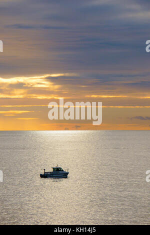 Chesil Beach, UK. 13th Nov, 2017. UK Weather. People make the most of the calm, sunny weather along Chesil beach, Isle of Portland Credit: stuart fretwell/Alamy Live News Stock Photo