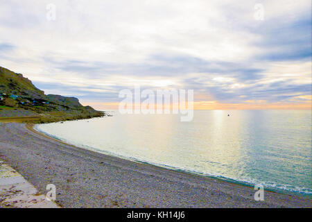 Chesil Beach, UK. 13th Nov, 2017. UK Weather. People make the most of the calm, sunny weather along Chesil beach, Isle of Portland Credit: stuart fretwell/Alamy Live News Stock Photo