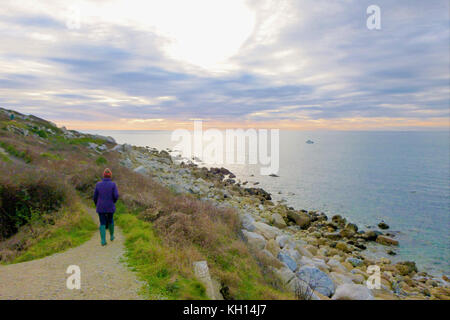 Chesil Beach, UK. 13th Nov, 2017. UK Weather. People make the most of the calm, sunny weather along Chesil beach, Isle of Portland Credit: stuart fretwell/Alamy Live News Stock Photo