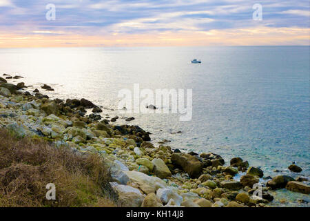 Chesil Beach, UK. 13th Nov, 2017. UK Weather. People make the most of the calm, sunny weather along Chesil beach, Isle of Portland Credit: stuart fretwell/Alamy Live News Stock Photo