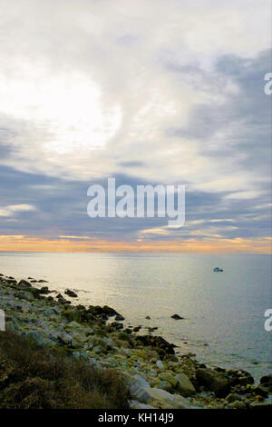 Chesil Beach, UK. 13th Nov, 2017. UK Weather. People make the most of the calm, sunny weather along Chesil beach, Isle of Portland Credit: stuart fretwell/Alamy Live News Stock Photo