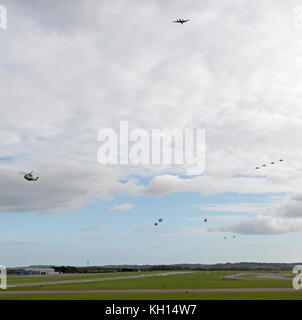 RNAS Culdrose, Cornwall, UK. 13th November, 2017. RNAS Culdrose aviation units conisting of Merlin MK2 and Sea King ASAC Helicopters, HawT1 Jets and a Beech KingAir 350 aircraft approach for a flypast at RNAS Culdrose. The 'embarkation' of multiple Royal Navy aircraft from RNAS Culdrose today. EXERCISE Kernow Flag has begun. With a new era of 'carrier aviation' just around the corner, Exercise Kernow Flag will help Culdrose to get 'Carrier Ready' through an intensive flying programme and test the whole air station Credit: Bob Sharples/Alamy Live News Stock Photo