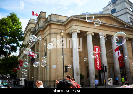 Bubbles in front of Canada House on Trafalgar Square Stock Photo