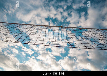 Tennis or volleyball beach net against blue sky Stock Photo