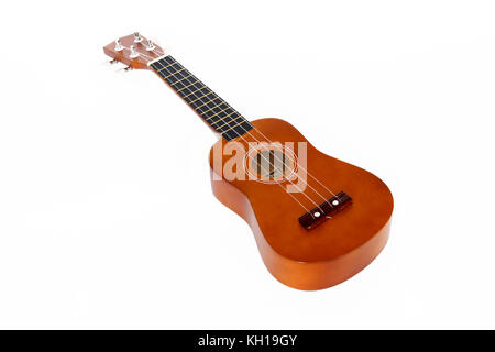 A natural wood ukulele on a white background Stock Photo
