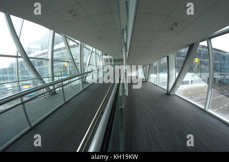 Walkway to airplane, inside bridge that headed to plane Stock Photo