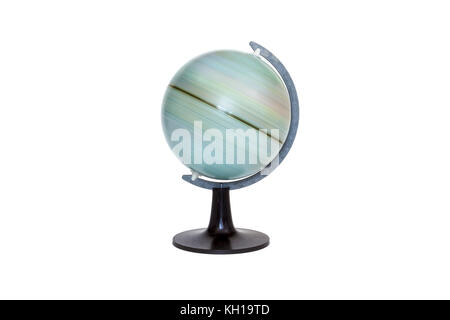 A small spinning geographical globe on white background Stock Photo