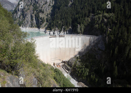 GIBIDUM DAM, NATERS, SWITZERLAND - September 22, 2017: View on the large hydroelectric power dam in the mountains of Wallis. Stock Photo