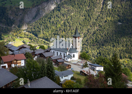 RIED-MOREL, SWITZERLAND - SEPT. 24, 2017: View on the centre of the mountain village with the Swiss Reformed Church, Friedhofkapelle. Stock Photo