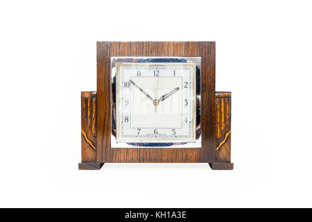 A vintage square-faced Sterling synchronous electric clock in polished wooden case, c1937 Stock Photo