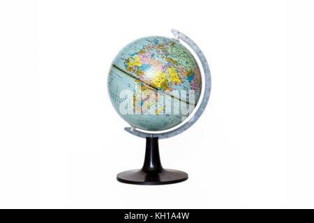 An old geographical globe showing the continent of Africa, on a white background Stock Photo