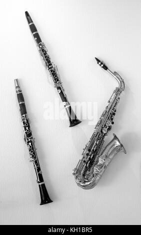 Beautiful brass instruments on the wall photographed in close-up Stock Photo