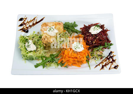 Salad of grated carrots, apple, beets and celery. Stock Photo