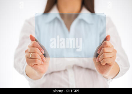 Pregnant woman holding blank futuristic transparent mobile with copy space for text Stock Photo