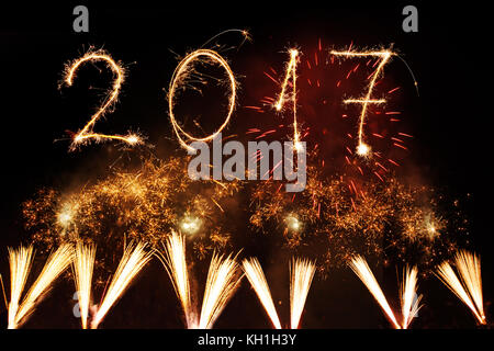 2017 Happy New Year written with Sparkle firework on black background, Stock Photo