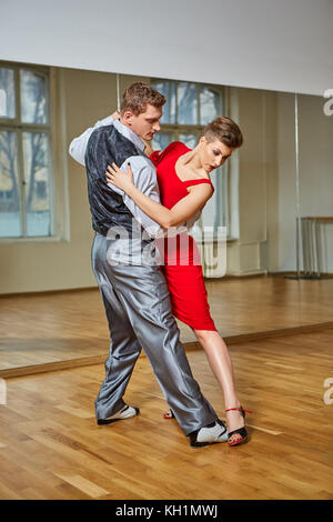 beautiful couple dancing tango Stock Photo