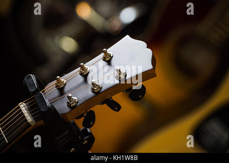 Acoustic classical guitars with strings in shop, France Stock Photo