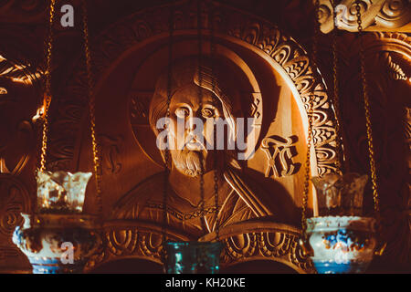 the face of Jesus carved out of wood in the Russian Church Stock Photo