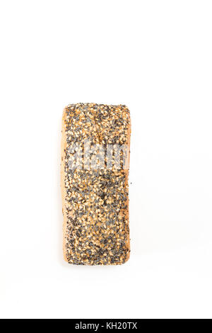 Whole wheat bread with seeds, on white background. Stock Photo