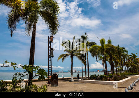 PUERTO VALLARTA, MEXICO - SEPTEMBER 6, 2015: Searching for Reason statue at Puerto Vallarta, Mexico. Sculpure was made by Sergio Bustamante in 2000. Stock Photo