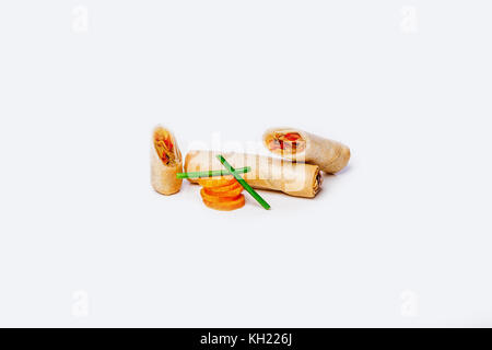Spring-rolls with vegetables on a white background. Stock Photo