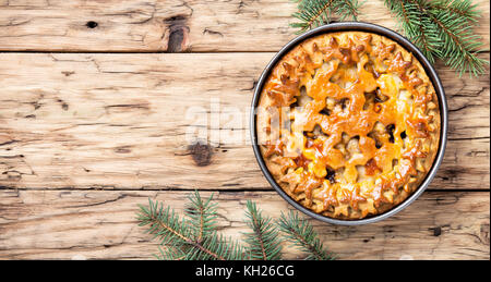 traditional christmas homemade pie on a retro background Stock Photo