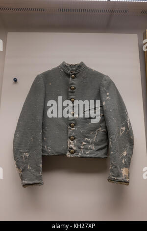 A bullet damaged Shell Jacket (c. 1861), National Civil War Museum, Lincoln Circle, Harrisburg, PA, United States Stock Photo