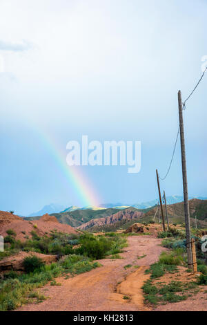 Rainbow over skazka aka fairy tale canyon, Kyrgyzstan Stock Photo