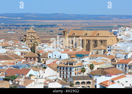 The Convent and Church of the Holy Trinity (1672-1683) and the Church of San Pedro (1522) in Antequera (Province of Malaga), Spain Stock Photo