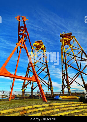Wind turbine platforms on river Tyne awaiting weather before completion in the North sea Stock Photo