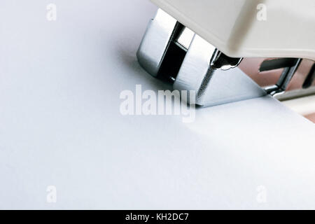 stapler for binding sheets of paper closeup. Stock Photo