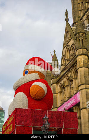 Giant Santa Claus above the Entrance to Manchester Town Hall, UK. Taken on 11 Nov 2017 on the first Saturday of the Manchester Christmas markets for 2