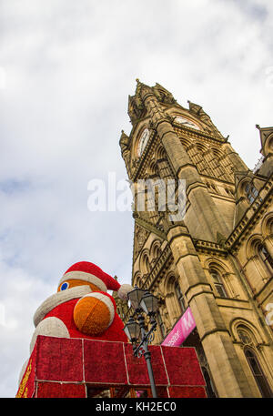 Giant Santa Claus above the Entrance to Manchester Town Hall, UK. Taken on 11 Nov 2017 on the first Saturday of the Manchester Christmas markets for 2