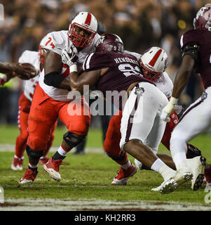 College Station, TX, USA. 11th Nov, 2017. New Mexico Lobos offensive lineman Ray Baylor III (74) in action against Texas A&M Aggies defensive lineman Zaycoven Henderson (92) during the NCAA football game between the New Mexico Lobos and the Texas A&M Aggies at Kyle Field in College Station, TX. Chris Brown/CSM/Alamy Live News Stock Photo