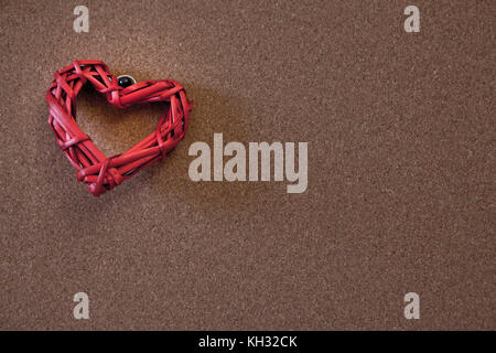 hearts tacked on a cork board Stock Photo