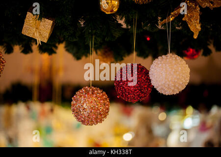 Beautiful decorated Christmas tree background with bauble and xmas ornaments blurred in bokeh home Stock Photo