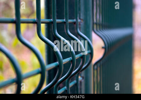 Close-up of dark green fence Stock Photo