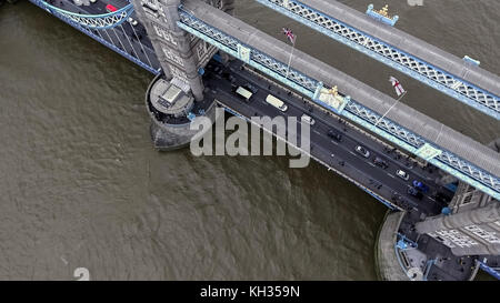 Aerial Bird Eye View of Iconic Tower Bridge with Traffic Transportation and River Thames in London England, UK 4K Stock Photo