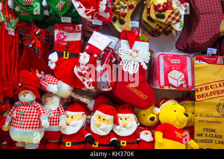 christmas gifts and decorations on sale in a shop Stock Photo