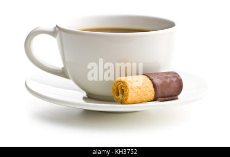 Sweet dessert. Biscuits rolls with chocolate icing isolated on white background. Stock Photo