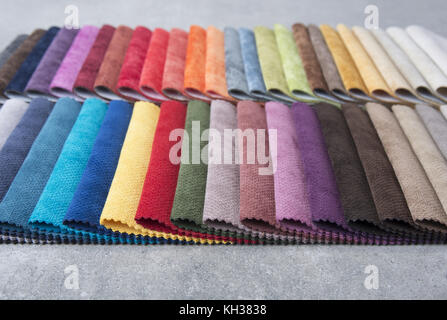 Colorful upholstery fabric samples in the store Stock Photo
