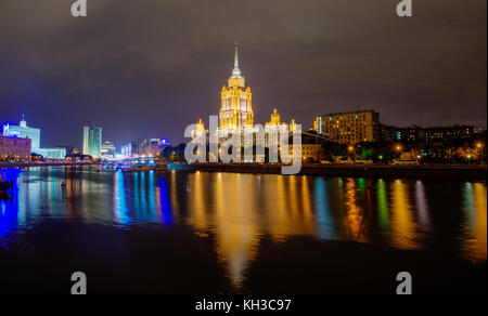 Hotel Ukraine - one of the seven sister skyscrapers, built in Moscow at the end of Stalin's reign (early 1950s). Seen as reflected in the Moscow River Stock Photo