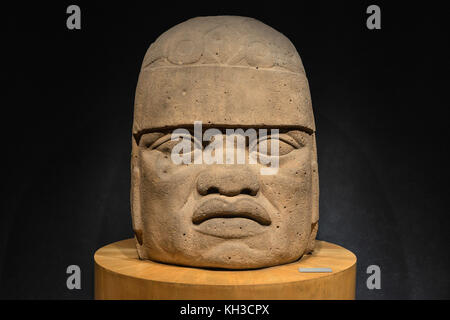 An Olmec colossal head sculpted from a large basalt boulder. The head dates from at least before 900 BC and is a distinctive feature of the Olmec civi Stock Photo
