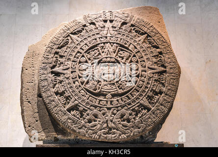 The Aztec calendar stone, Mexica sun stone, Stone of the Sun  or Stone of the Five Eras, is a large monolithic sculpture that was excavated in the Zóc Stock Photo