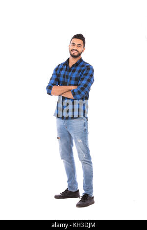 Full-length shot of handsome happy beard young man smiling and standing confidently, guy wearing blue Caro shirt and jeans, isolated on white backgrou Stock Photo