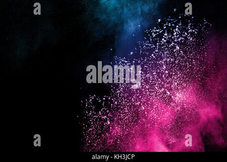 Multicolored powder splash cloud isolated on black background Stock Photo