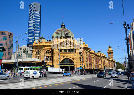 Flinders Street Railway Station (with Eureka Tower in background) on corner of Flinders and Swanston Streets in Melbourne, Victoria, Australia Stock Photo