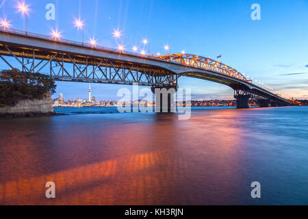 Auckland Harbour Bridge at twilight from Northcote Point. Stock Photo