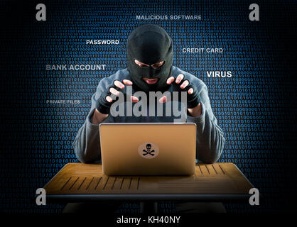 Hacker is ready to start hacking laptop Stock Photo